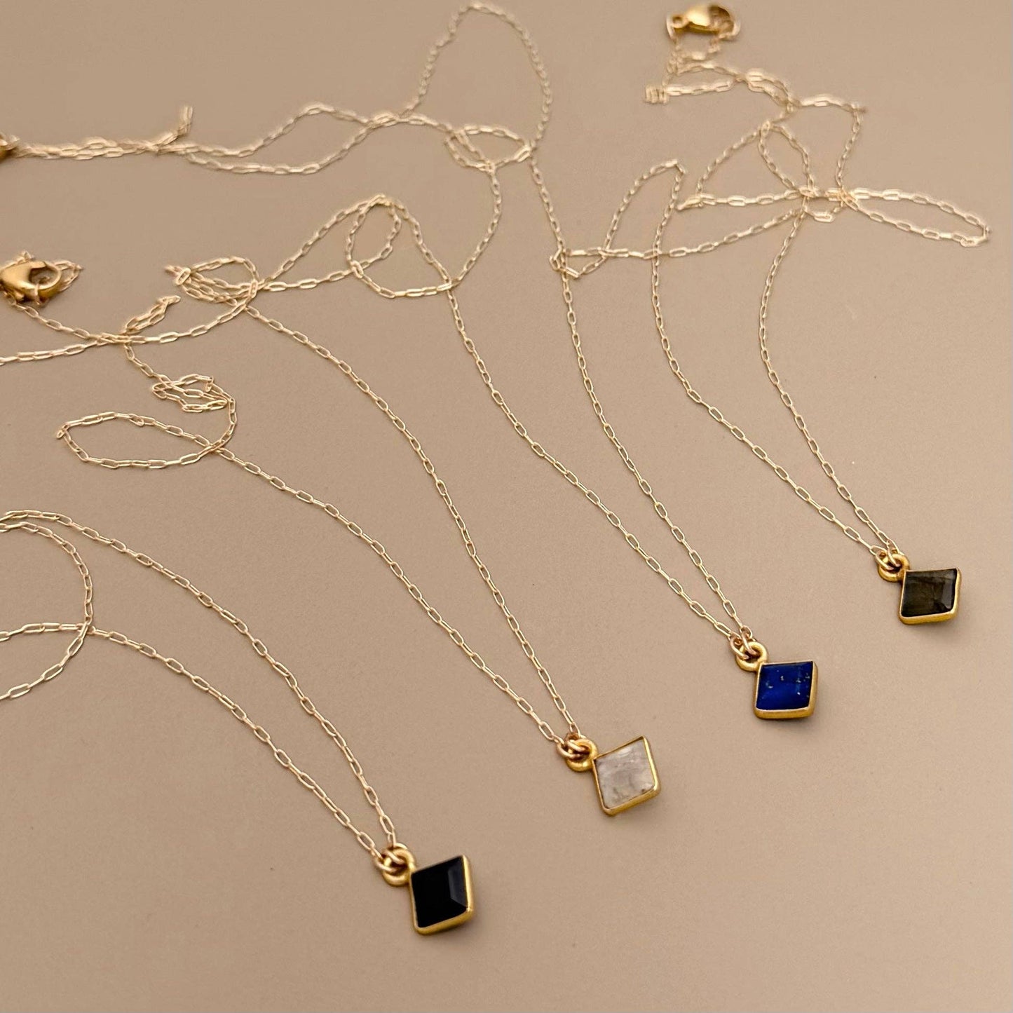 Meridian Necklaces on gold